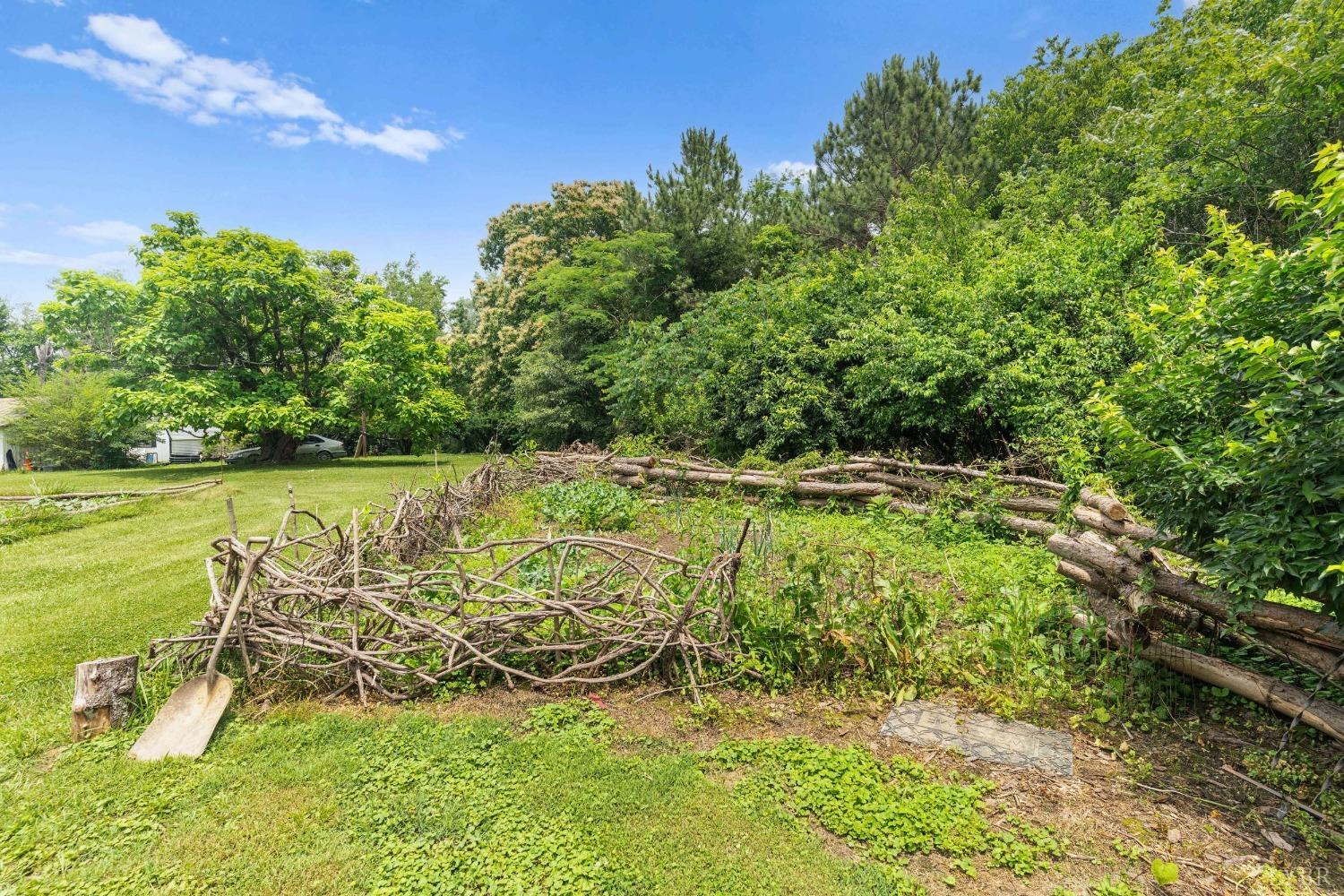 65 Phoenix Road Arrington, VA 22922 - Photo 50 of 58 a view of a garden with an outdoor space