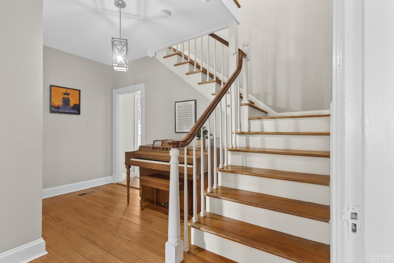 65 Phoenix Road Arrington, VA 22922 - Photo 9 of 58 a view of entryway and hall with wooden floor