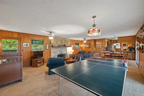a view of a living room and dining room