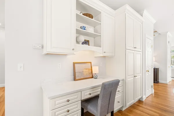 a room with cabinets and wooden floor