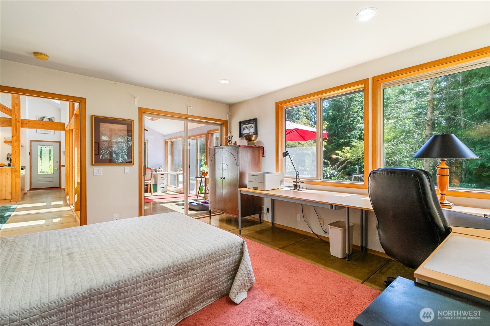 2490 Goshen Road Bellingham, WA 98226 - Photo 20 of 40 a bedroom with a large bed and large windows