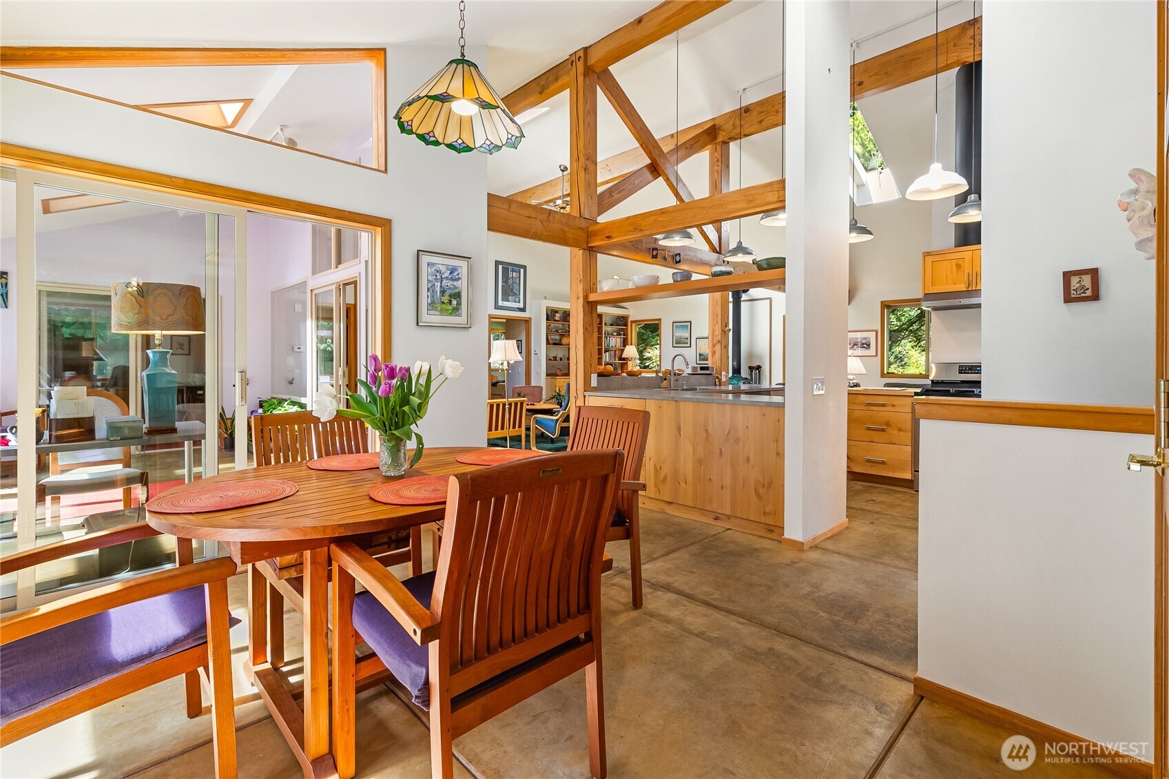 2490 Goshen Road Bellingham, WA 98226 - Photo 4 of 40 a dining room with furniture and a floor to ceiling window