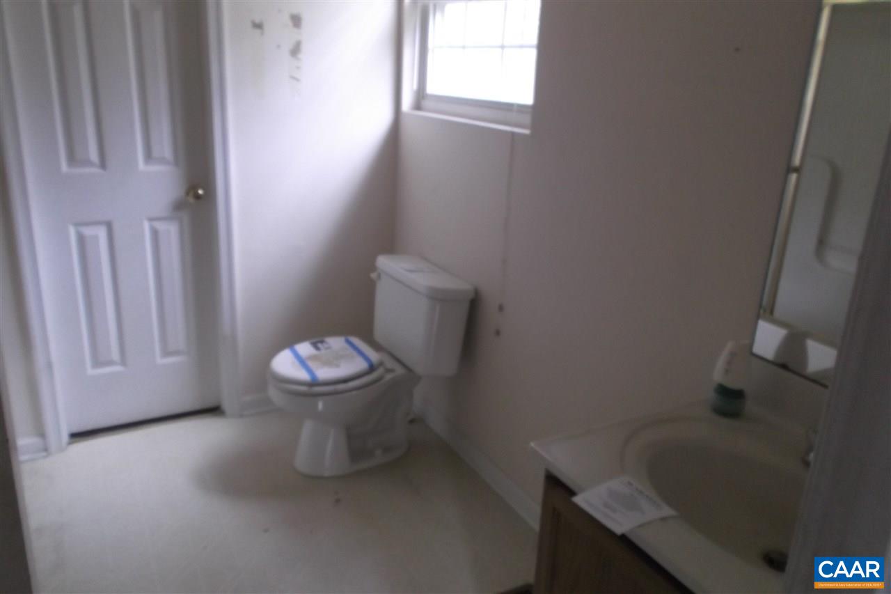176 Old Farm Road Ruckersville, VA 22968 - Photo 5 of 7 a bathroom with a sink and a toilet