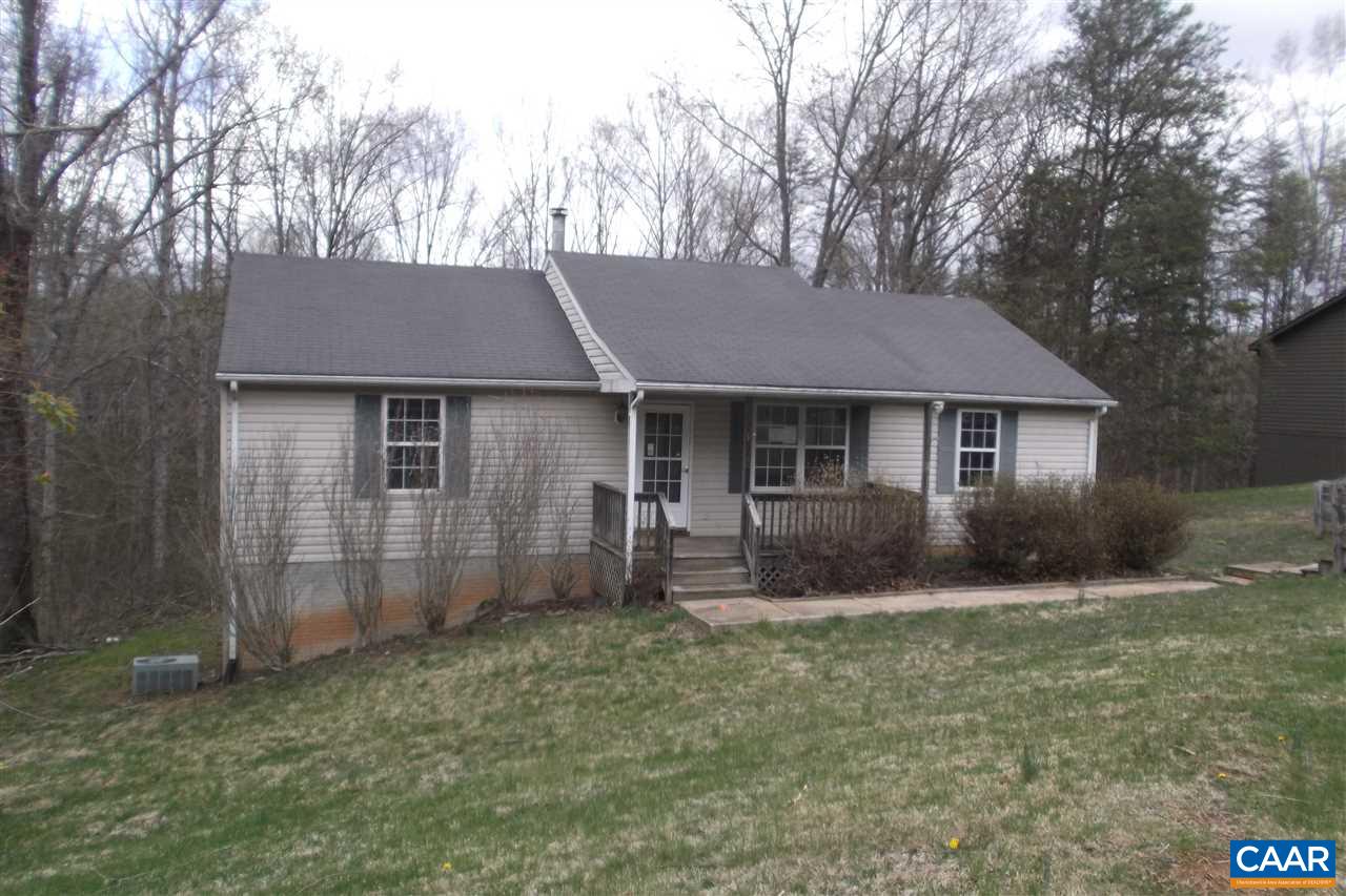 176 Old Farm Road Ruckersville, VA 22968 - Photo 7 of 7 a front view of a house with a garden