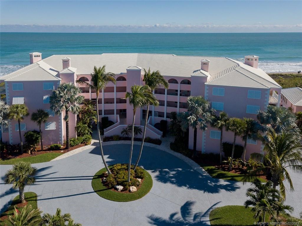 1701 Northeast Ocean Boulevard, Unit 103 Stuart, FL 34996 - Photo 2 of 46 an aerial view of a house with a garden view