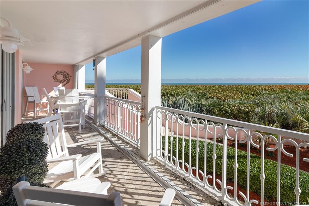 1701 Northeast Ocean Boulevard, Unit 103 Stuart, FL 34996 - Photo 33 of 46 a view of a chairs and tables in the balcony