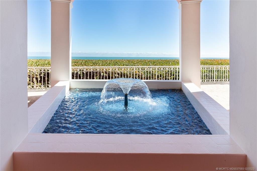 1701 Northeast Ocean Boulevard, Unit 103 Stuart, FL 34996 - Photo 39 of 46 a view of a porch