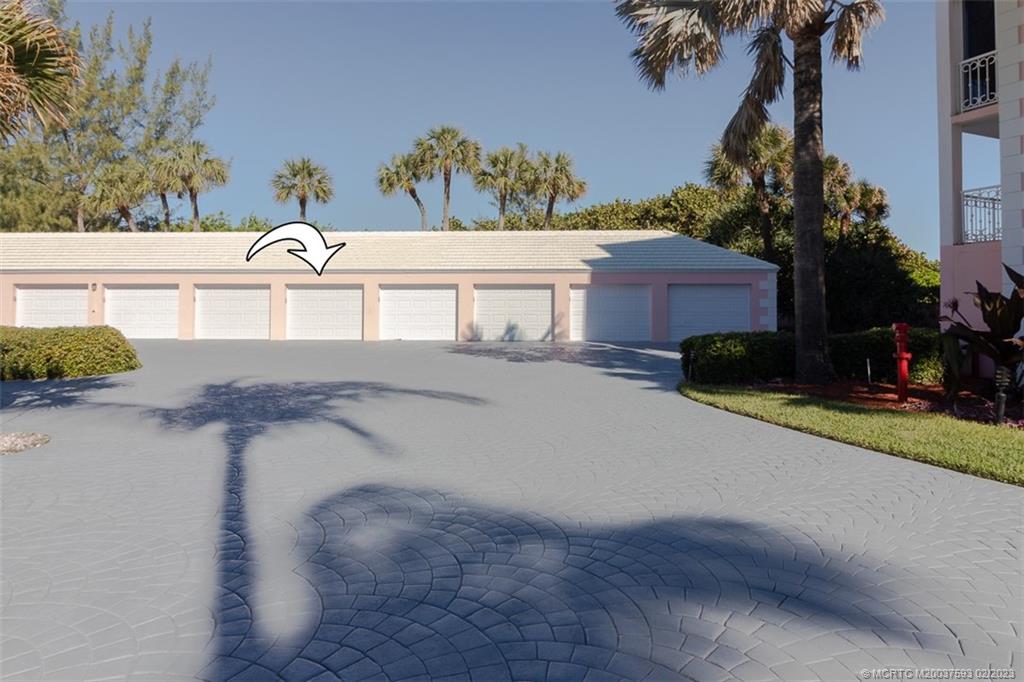1701 Northeast Ocean Boulevard, Unit 103 Stuart, FL 34996 - Photo 40 of 46 a view of a house with a street