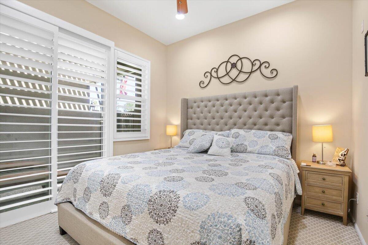 49465 Lewis Road Indio, CA 92201 - Photo 18 of 30 a bedroom with a bed and a window