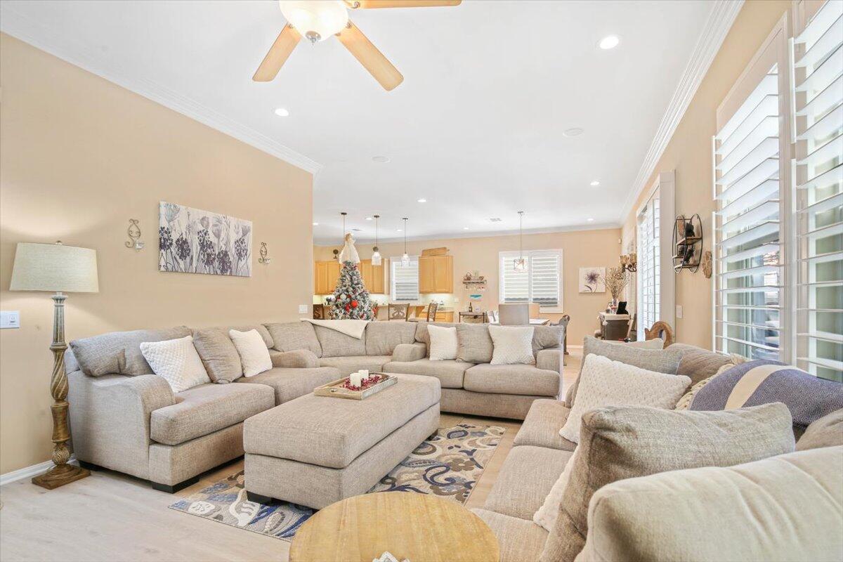 49465 Lewis Road Indio, CA 92201 - Photo 22 of 30 a living room with furniture and a large window