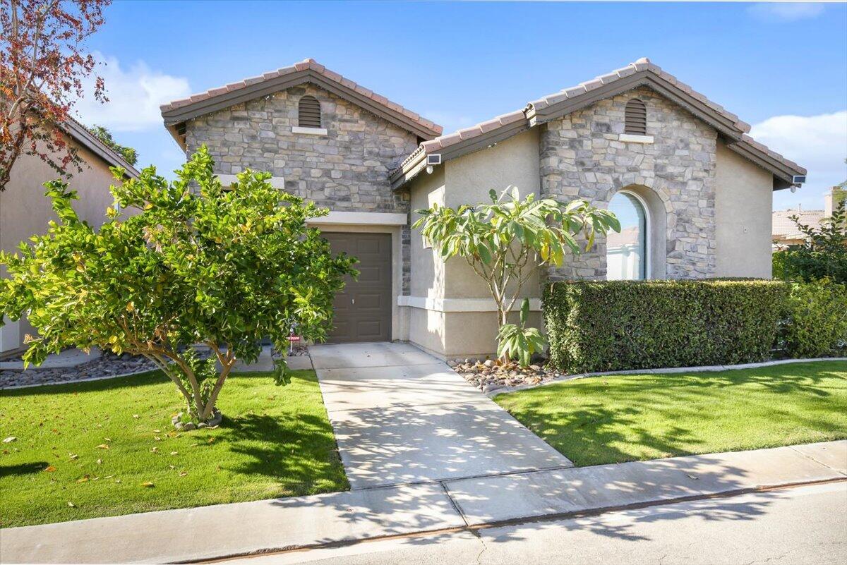 49465 Lewis Road Indio, CA 92201 - Photo 30 of 30 a front view of a house with garden