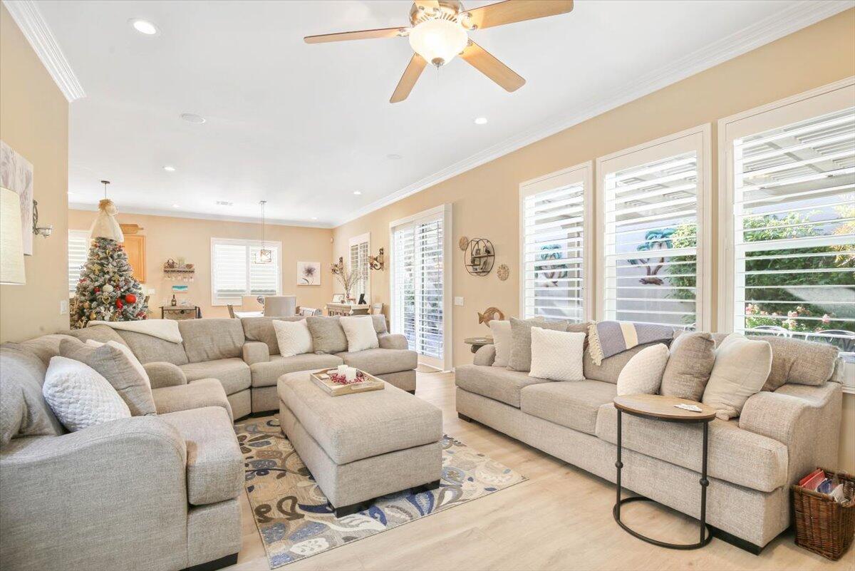 49465 Lewis Road Indio, CA 92201 - Photo 4 of 30 a living room with furniture and a large window