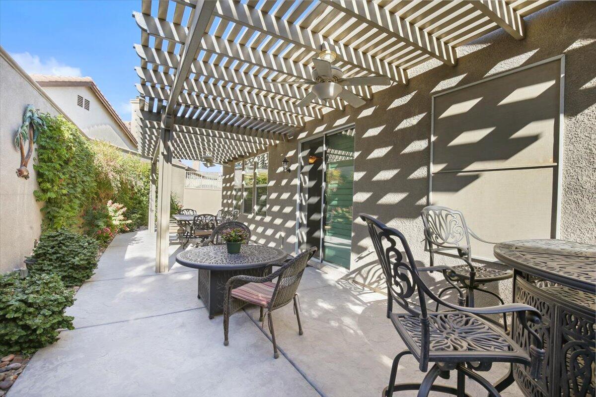 49465 Lewis Road Indio, CA 92201 - Photo 6 of 30 a view of a chairs and table in the patio