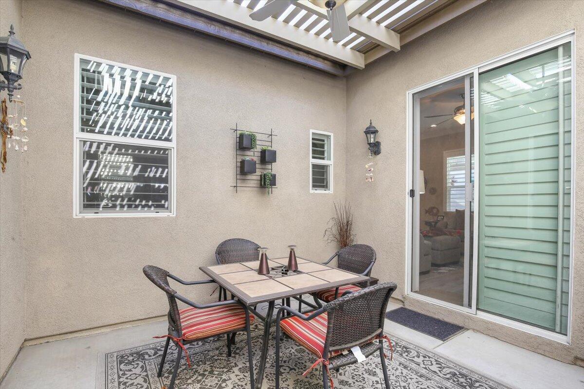 49465 Lewis Road Indio, CA 92201 - Photo 9 of 30 a dining room with furniture and window