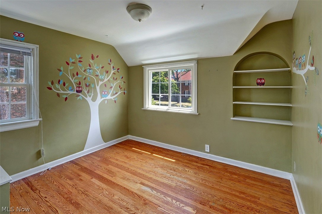 3451 Edison Road Cleveland Heights, OH 44121 - Photo 12 of 18 Bedroom number 3 on the second floor has built-in shelves--lots of character in this sweet house.