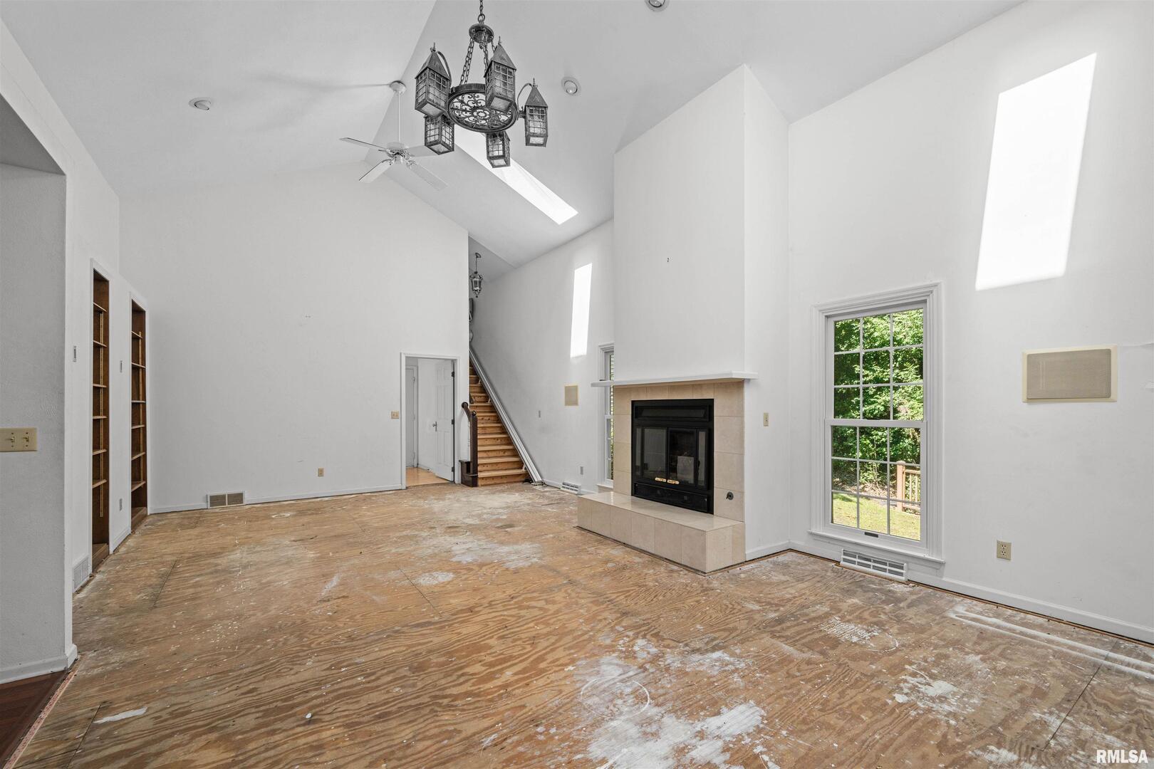 5 White Oak Court Moline, IL 61265 - Photo 13 of 57 a view of an empty room with a fireplace