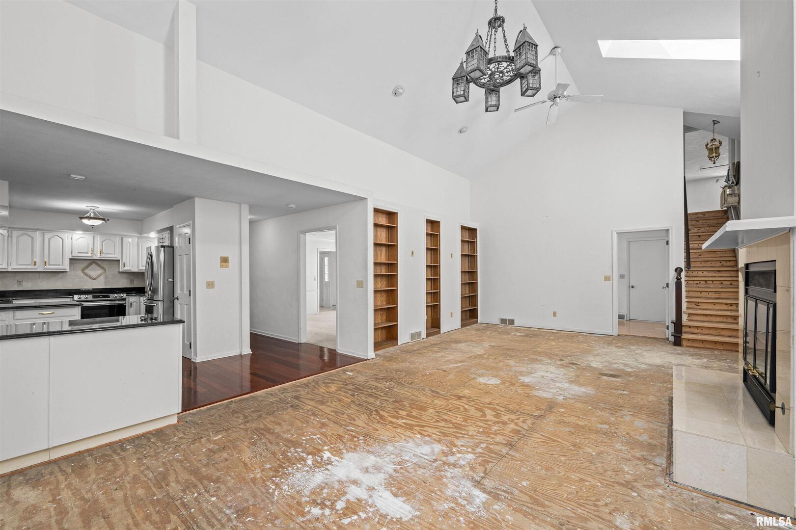 5 White Oak Court Moline, IL 61265 - Photo 14 of 57 a view of a kitchen with a sink and cabinets