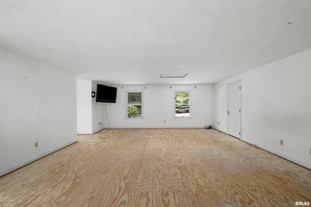 a utility room with sink dryer and washer