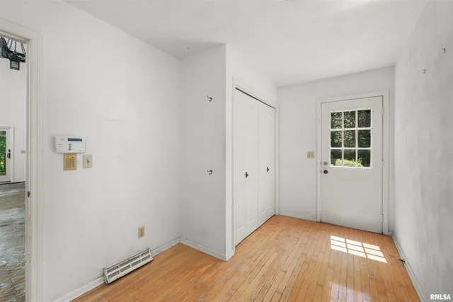 a view of an entryway with a window