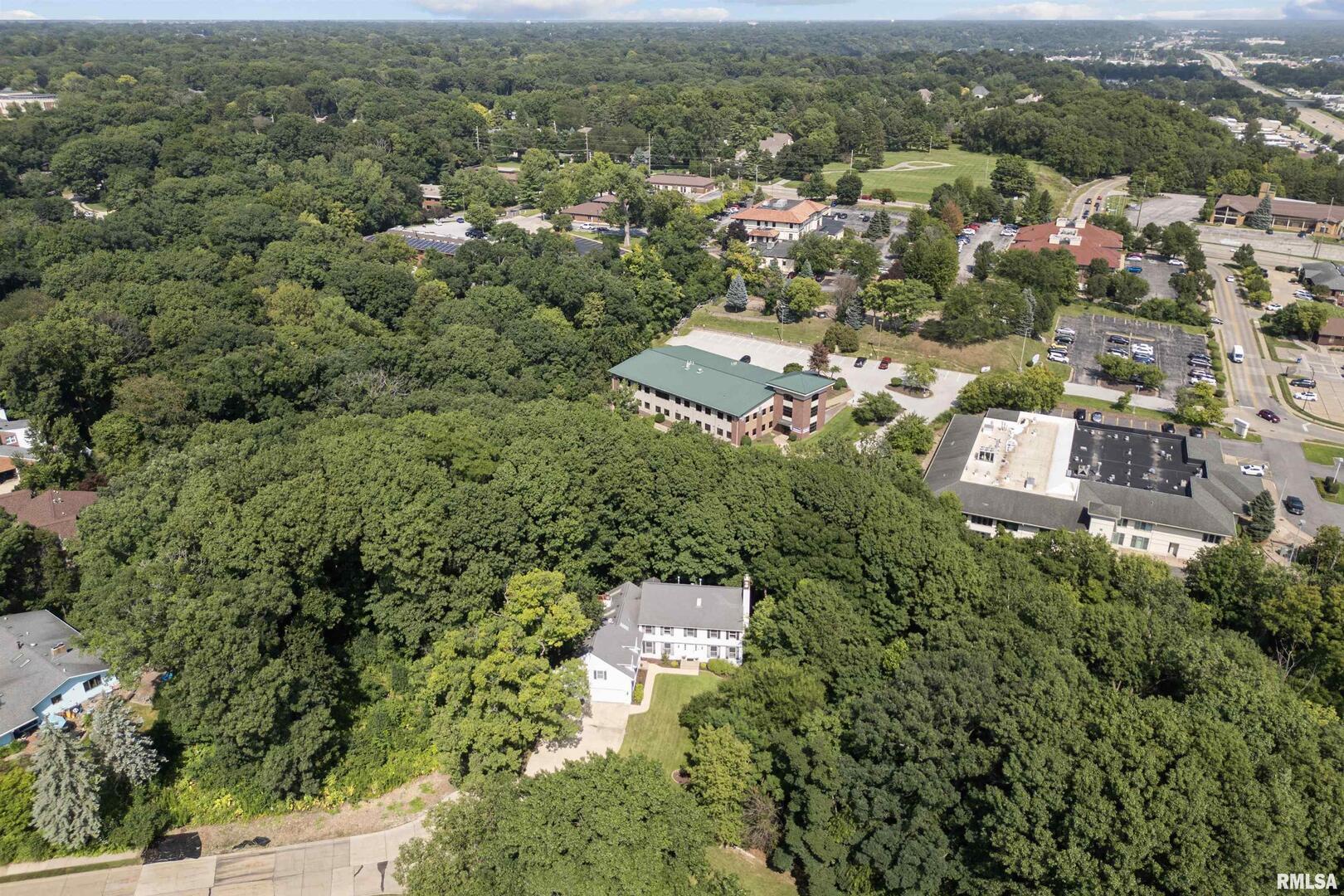 5 White Oak Court Moline, IL 61265 - Photo 3 of 57 an aerial view of residential house with parking space