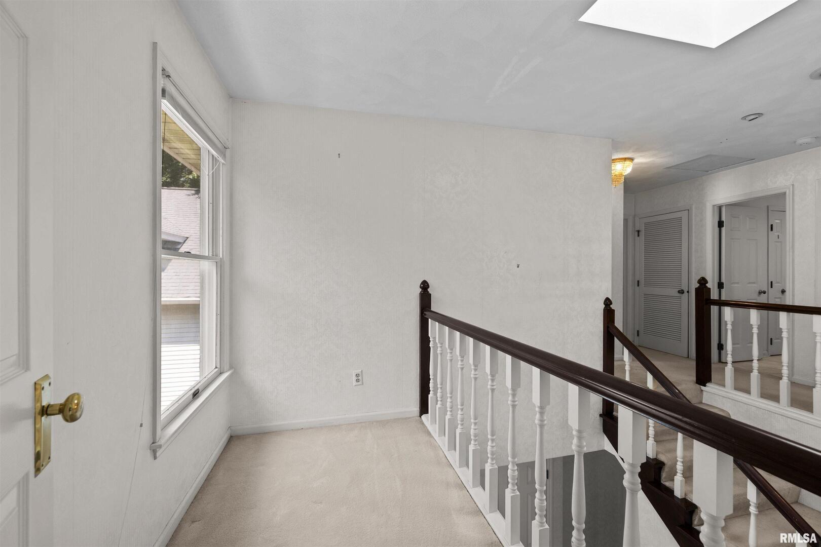 5 White Oak Court Moline, IL 61265 - Photo 33 of 57 a view of an entryway with a window