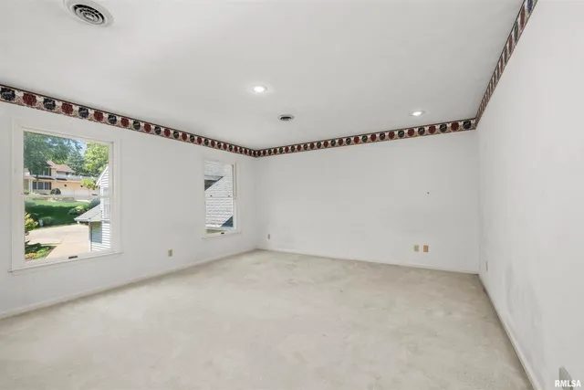 a bathroom with a tub and a shower