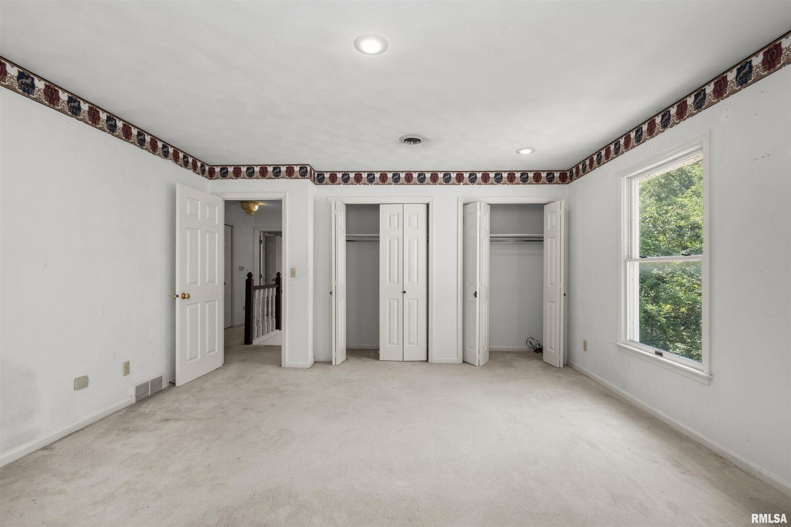5 White Oak Court Moline, IL 61265 - Photo 37 of 57 a view of an empty room with a window