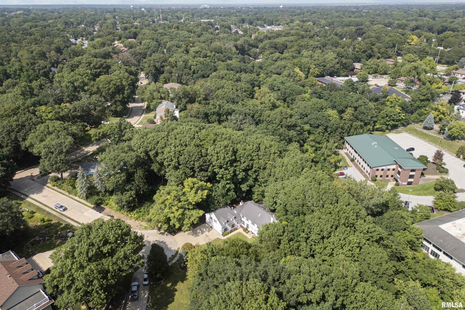 5 White Oak Court Moline, IL 61265 - Photo 4 of 57 an aerial view of residential house with parking space and trees