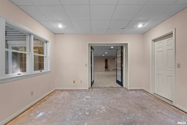 a view of a backyard with sitting area