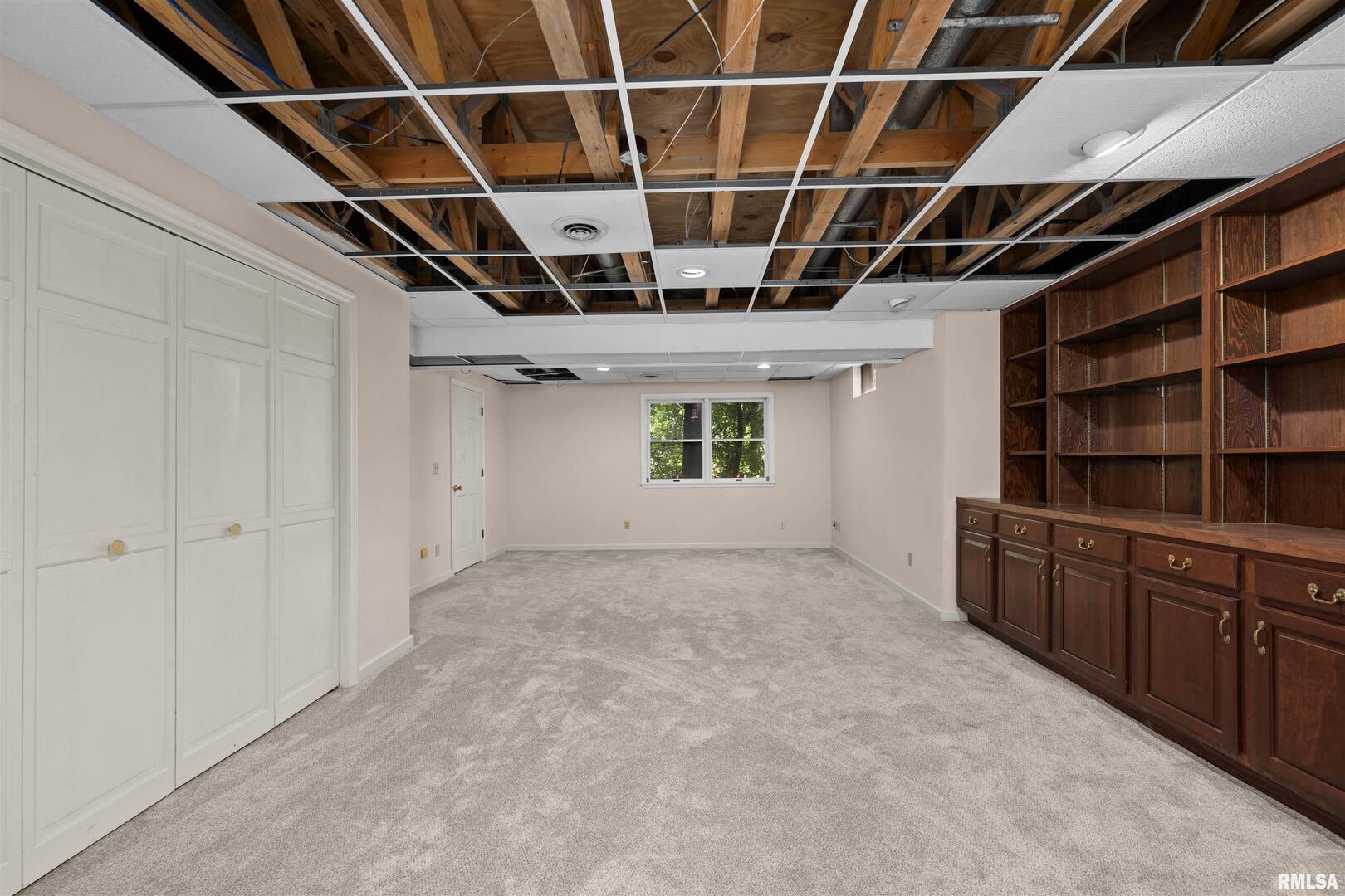 5 White Oak Court Moline, IL 61265 - Photo 52 of 57 a view of an empty room with a window