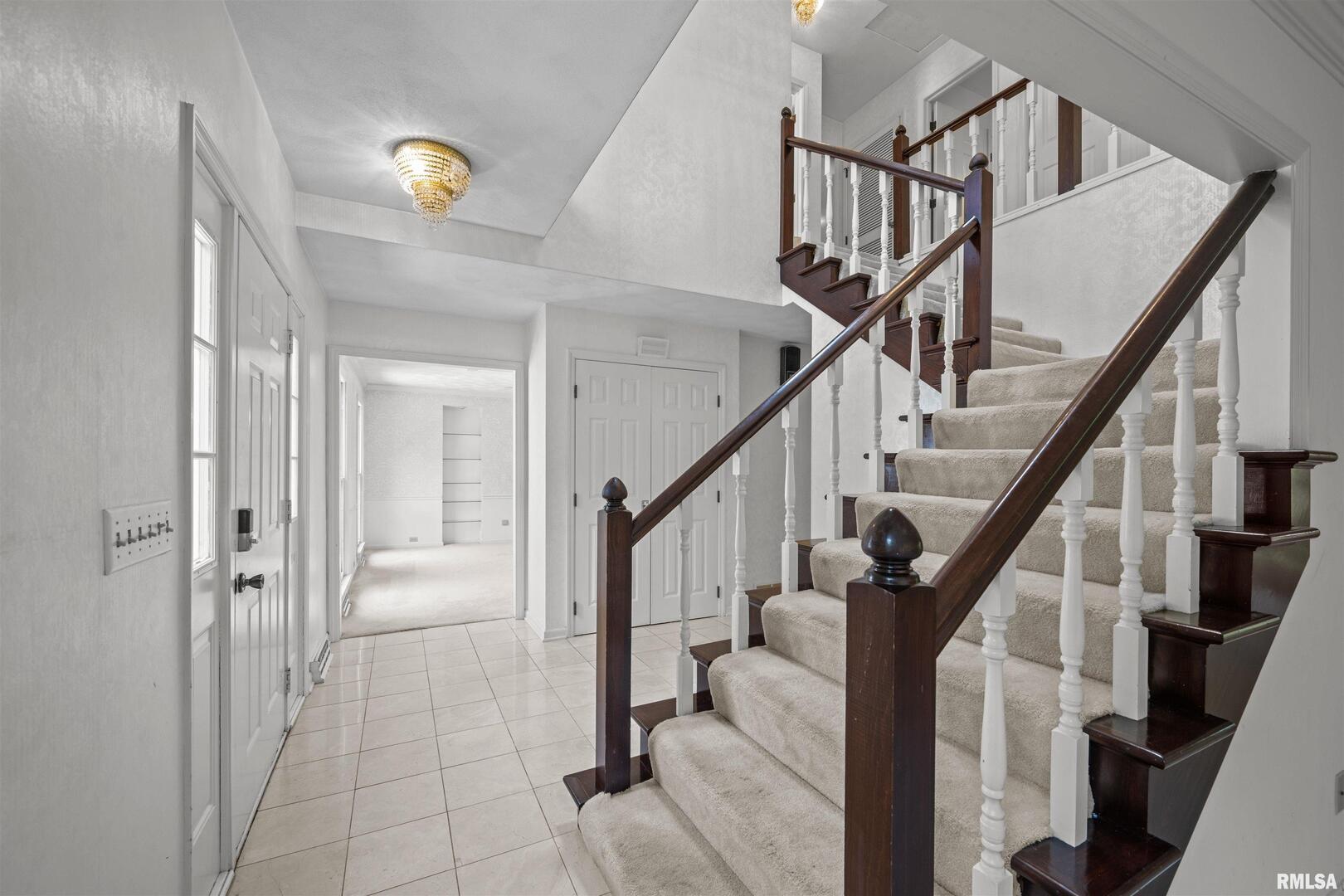 5 White Oak Court Moline, IL 61265 - Photo 6 of 57 a view of entryway and hall with wooden floor