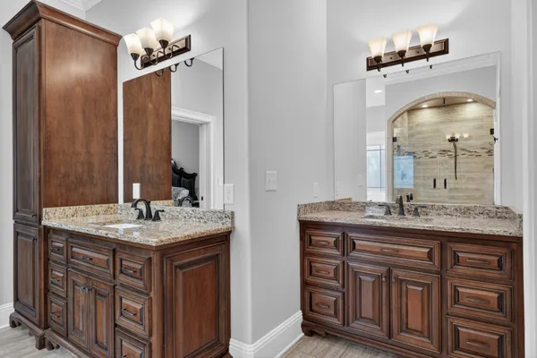 view of a bathroom with a tub and shower