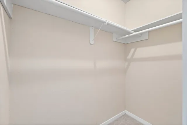 a bathroom with a sink a mirror and a shower