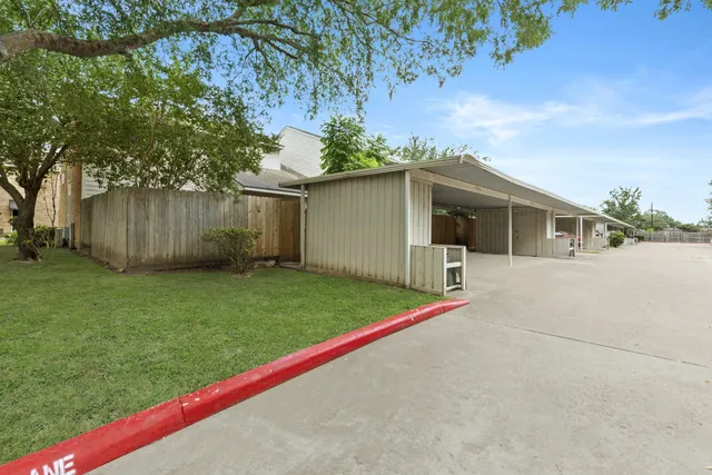 a view of a house with a outdoor space and balcony