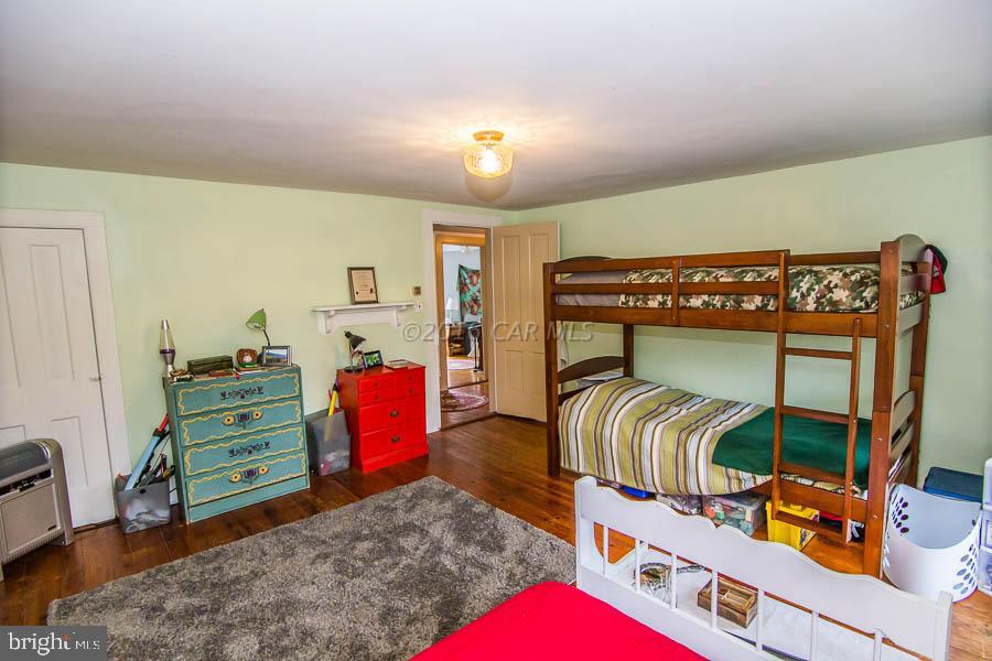 3113 Whitehaven Road Tyaskin, MD 21865 - Photo 22 of 44 a bedroom with furniture and a wooden floor