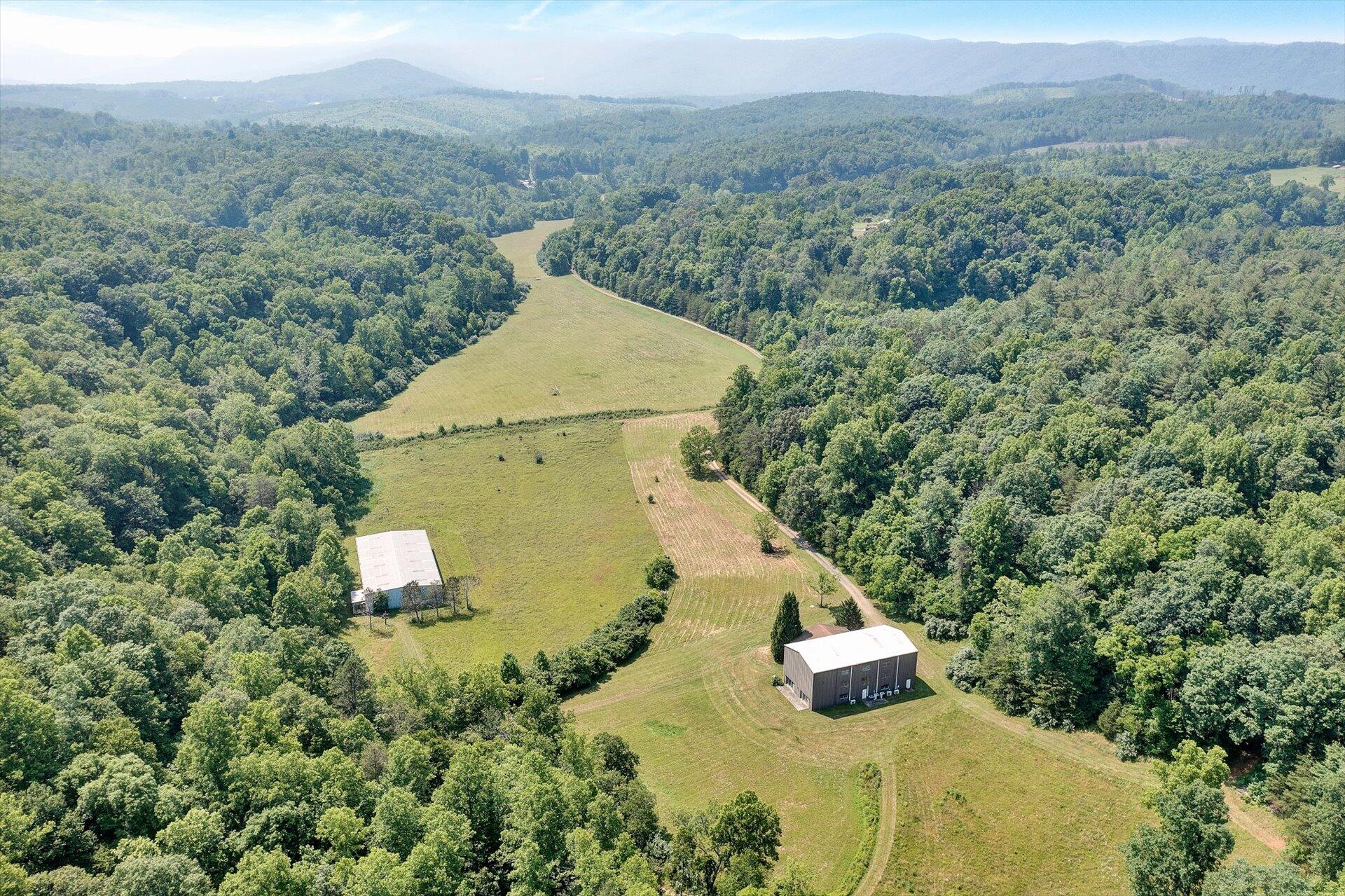 a aerial view of a house with a yard
