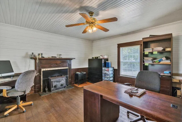 a bedroom with bed and window