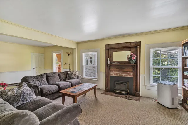 a bed room with a bed and a window