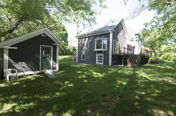 4 Shaw Street Medway, MA 02053 - Photo 4 of 25 a view of a house with a yard and large tree