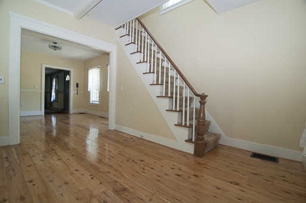 4 Shaw Street Medway, MA 02053 - Photo 6 of 25 a view of an entryway with wooden floor and door