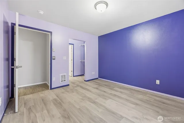 a view of empty room with windows