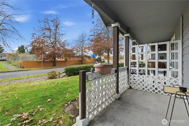 a view of a porch with a yard