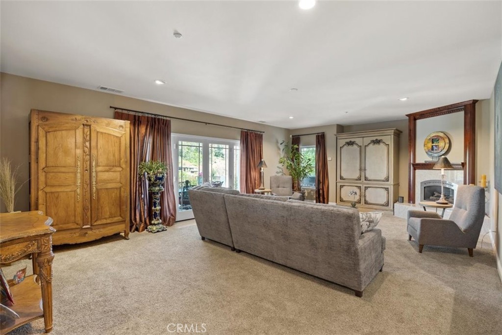 3217 Shallow Springs Terrace Chico, CA 95928 - Photo 22 of 55 a living room with furniture and windows