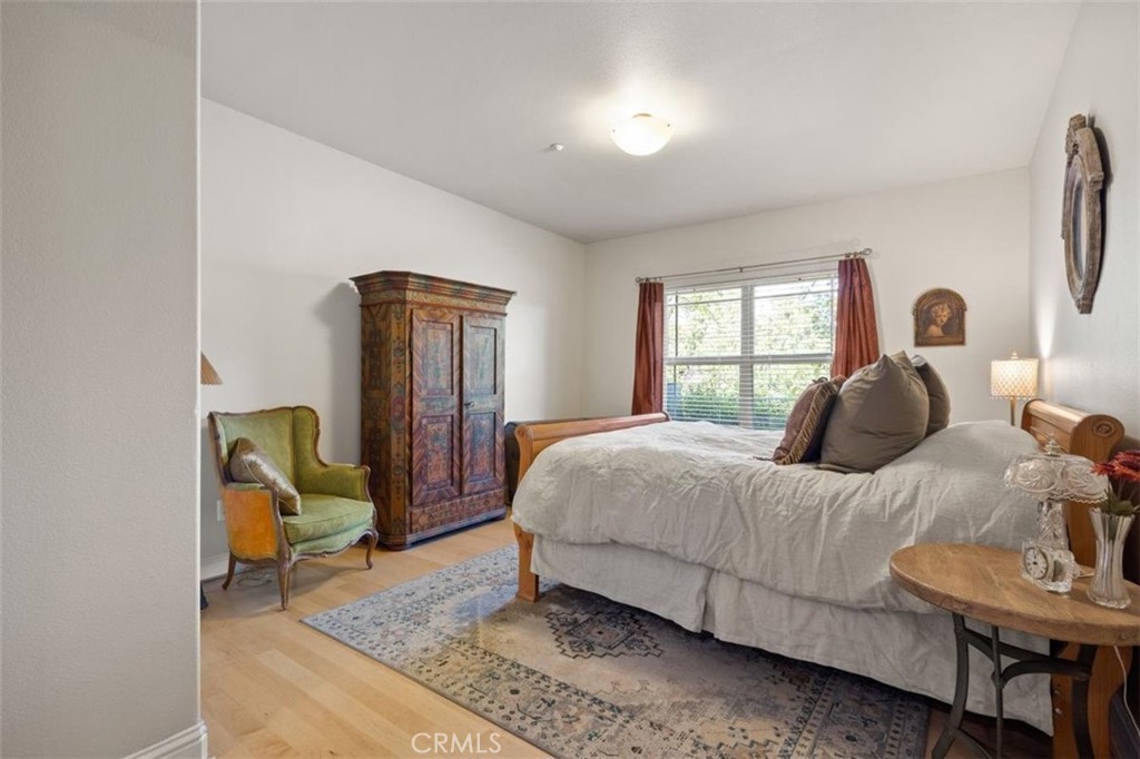 3217 Shallow Springs Terrace Chico, CA 95928 - Photo 35 of 55 a bedroom with a bed chair and window