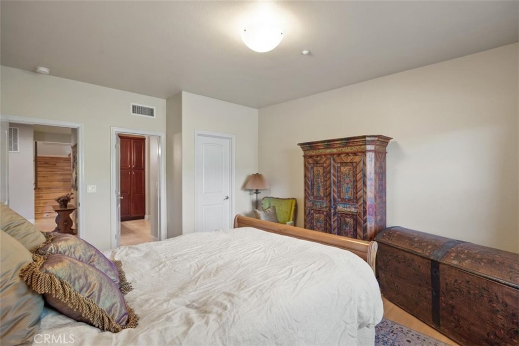 3217 Shallow Springs Terrace Chico, CA 95928 - Photo 36 of 55 a bedroom with a bed and a dresser