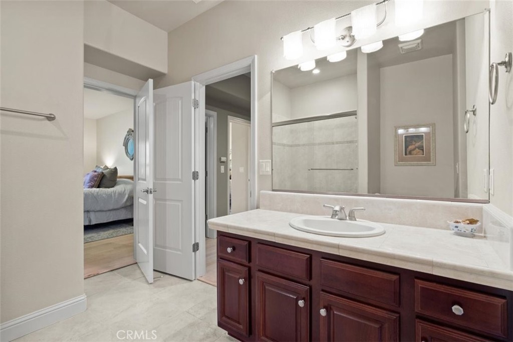 3217 Shallow Springs Terrace Chico, CA 95928 - Photo 38 of 55 a spacious bathroom with a sink double vanity and a mirror