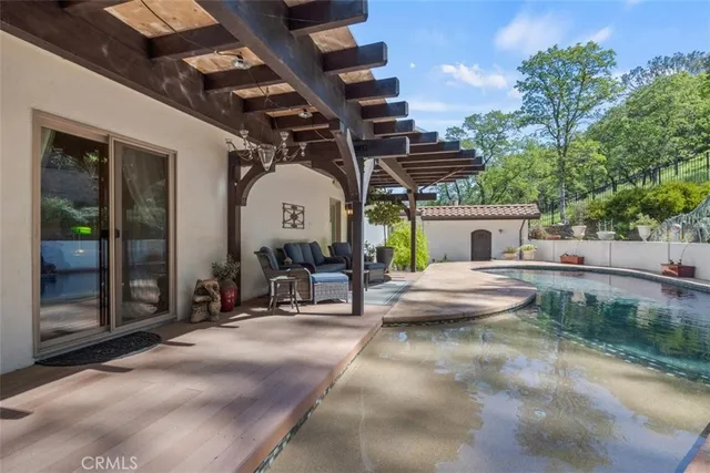 a view of a city from a dining room with large windows