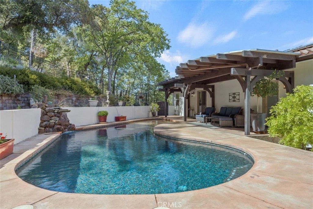 3217 Shallow Springs Terrace Chico, CA 95928 - Photo 46 of 55 a view of a swimming pool with a patio