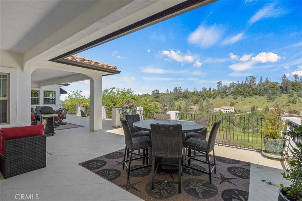3217 Shallow Springs Terrace Chico, CA 95928 - Photo 5 of 55 a view of a chairs and table in patio