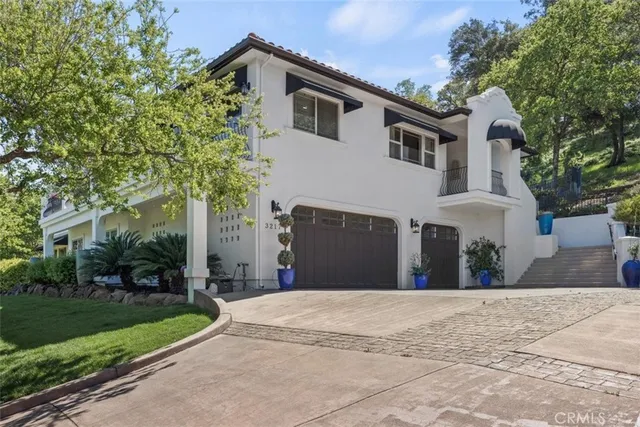 a view of entryway with a front door and wooden floor